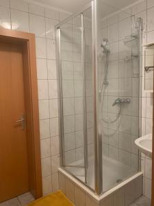 A bathroom at Schilcherland-Apartment