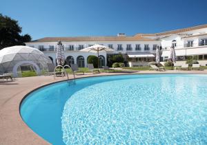 Πισίνα στο ή κοντά στο Montebelo Principe Perfeito Viseu Garden Hotel