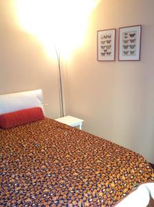 เตียงในห้องที่ Pinturicchio, Characteristic and comfortable apartment in the historic center