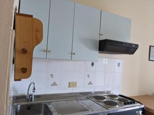 Kuchyň nebo kuchyňský kout v ubytování Residenza Lido Degli Estensi Affitti Brevi Italia