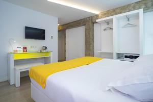 Posteľ alebo postele v izbe v ubytovaní Atarazanas Málaga Boutique Hotel