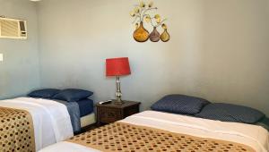 Ένα ή περισσότερα κρεβάτια σε δωμάτιο στο Copper Mountain Motel +48 φωτογραφίες