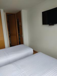 TV a/nebo společenská místnost v ubytování Hotel Dorado Ferial
