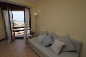 Χώρος καθιστικού στο El Faro Apartaments Platja Llarga-Les Salines-TGN