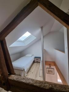 Postel nebo postele na pokoji v ubytování Le Crocolion