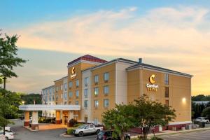 a rendering of the front of a cranberry hotel at Comfort Suites Fredericksburg North in Fredericksburg