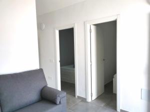A seating area at Apartamentos Anjomacar A