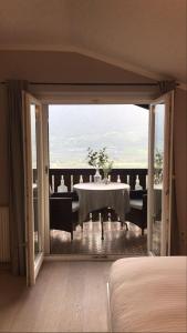 Ένα ή περισσότερα κρεβάτια σε δωμάτιο στο Villa Corazza-Bezauberndes Appartment+ Schwimmbad