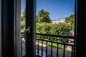 Un balcón o terraza de Hotel Pombal Rooms