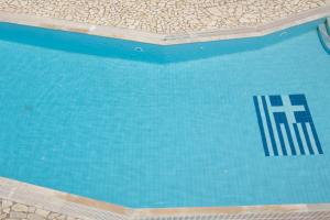 Bazén v ubytování APRAOS BAY HOTEL nebo v jeho okolí