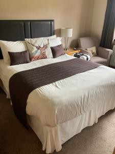 Postel nebo postele na pokoji v ubytování Mayfield B&B