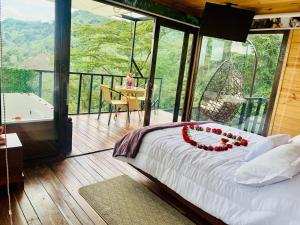 Postel nebo postele na pokoji v ubytování Ecohotel Portillo de San Bernardo