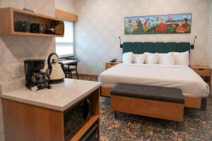 Postel nebo postele na pokoji v ubytování The Dorothy Motel