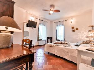 Postel nebo postele na pokoji v ubytování Locanda Acervum