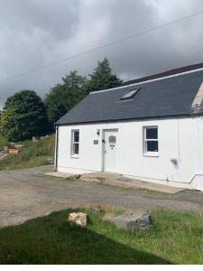 a white building with a black roof at 3 Dialknowe Holiday Cottage - Wanlockhead in Wanlockhead