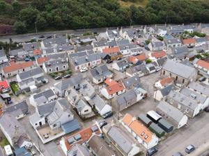 an aerial view of a small town with houses at 85 Seatown in Cullen