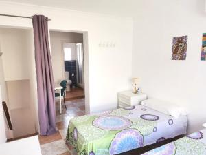 Postel nebo postele na pokoji v ubytování Casa Maria