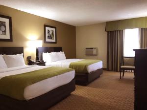 Кровать или кровати в номере NavajoLand Hotel