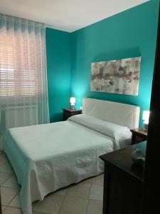 Posteľ alebo postele v izbe v ubytovaní Villa Mancosta