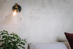 Postel nebo postele na pokoji v ubytování AiMen Homestay