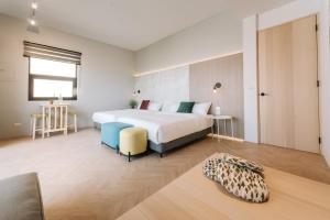 Postel nebo postele na pokoji v ubytování AiMen Homestay