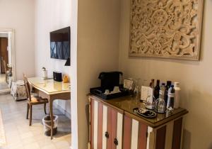 Příslušenství pro přípravu čaje a kávy v ubytování La Concordia - Boutique Hotel