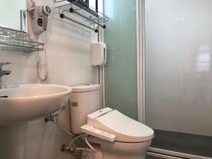 Vannituba majutusasutuses Longtian Prosperity BnB +37 fotot