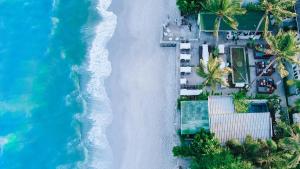 an aerial view of the beach and the ocean at Green Gallery Beach Boutique Hotel in Hua Hin