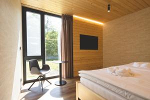 TV a/nebo společenská místnost v ubytování Forest Resort