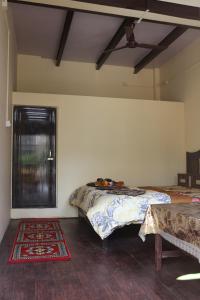Postel nebo postele na pokoji v ubytování Mother Hostel