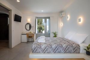 Uma cama ou camas num quarto em Sea View Beach Hotel