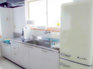 Kuhinja oz. manjša kuhinja v nastanitvi Guesthouse Ise Futami