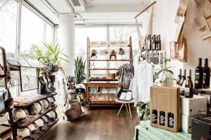 a room with bottles of wine and plants at Hotel Daniel Vienna - Smart Lifestyle Near City Centre in Vienna