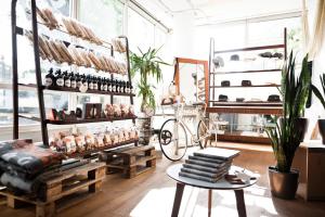 a room with a bike and a shelf with wine bottles at Hotel Daniel Vienna - Smart Lifestyle Near City Centre in Vienna