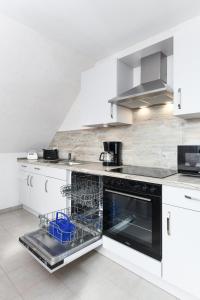 Billede fra billedgalleriet på Ferienwohnung im Haus Hafenlicht i Neuharlingersiel + 14 billeder