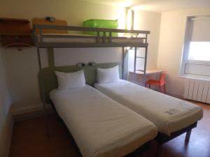 
Двухъярусная кровать или двухъярусные кровати в номере ibis budget Limoges
