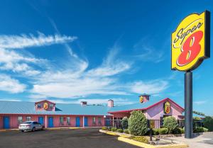 a sign in front of a fast food restaurant at Super 8 by Wyndham Eastland in Eastland