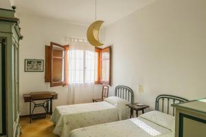 Кровать или кровати в номере Casa al Bragone