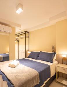 Postel nebo postele na pokoji v ubytování Espaço a beira mar de João Pessoa com jacuzzi e pé na areia + 94 fotografií