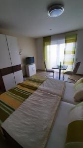 Postel nebo postele na pokoji v ubytování Casa la vino