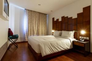 Postel nebo postele na pokoji v ubytování Hotel A.S. Lisboa