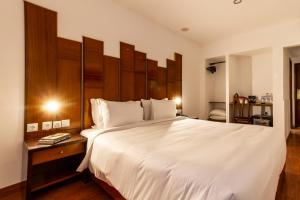 Postel nebo postele na pokoji v ubytování Hotel A.S. Lisboa