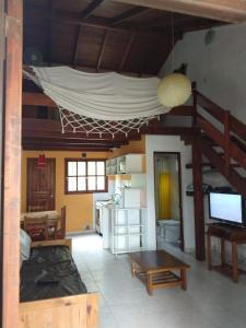 Una televisión o centro de entretenimiento en Casabosque Apartamentos