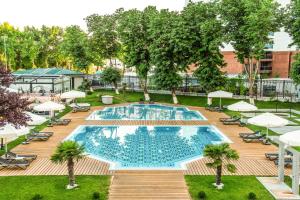 an overhead view of a pool at a hotel at City Palace Hotel Tashkent in Tashkent
