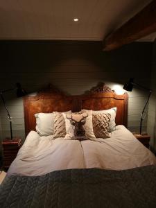 Säng eller sängar i ett rum på Smedjan cottage