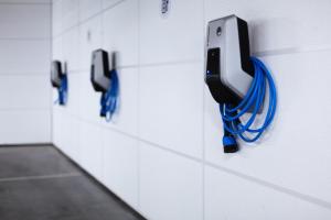 a row of phones hanging on a wall at Holiday Inn Express - Erlangen, an IHG Hotel in Erlangen