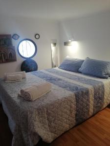 Ένα ή περισσότερα κρεβάτια σε δωμάτιο στο La Rosa de Barbate