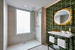 Koupelna v ubytování Urban Yard Hotel