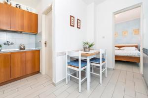 Postel nebo postele na pokoji v ubytování Apartment Casa Banko