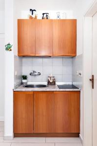 Kuchyň nebo kuchyňský kout v ubytování Apartment Casa Banko